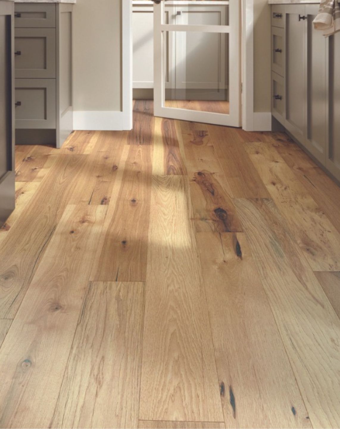 hardwood flooring in sunlit kitchen