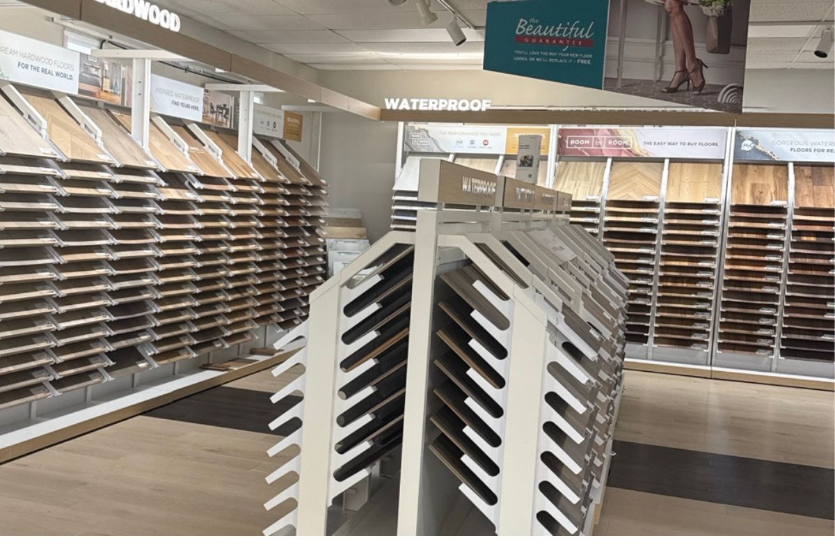 Image Alt TextHardwood and luxury vinyl flooring displays at Carpet Master Carpet One showroom in Champaign Illinois